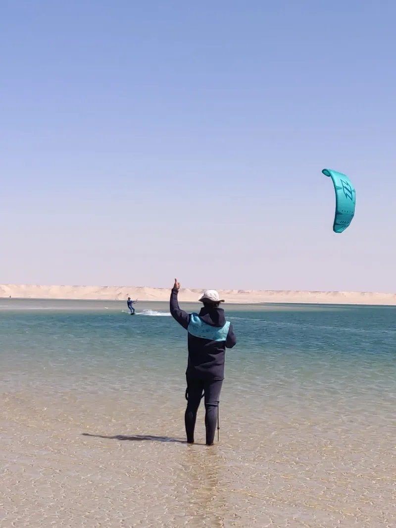 Sunset kitesurfing session at Dakhla lagoon, Morocco